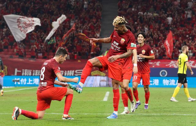 九游娱乐中心-【中超】奥斯卡两球武磊伤退 海港2比1险胜西海岸